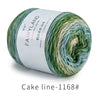 Spool of Fairyyland green and blue gradient cotton-wool yarn for knitting and crochet