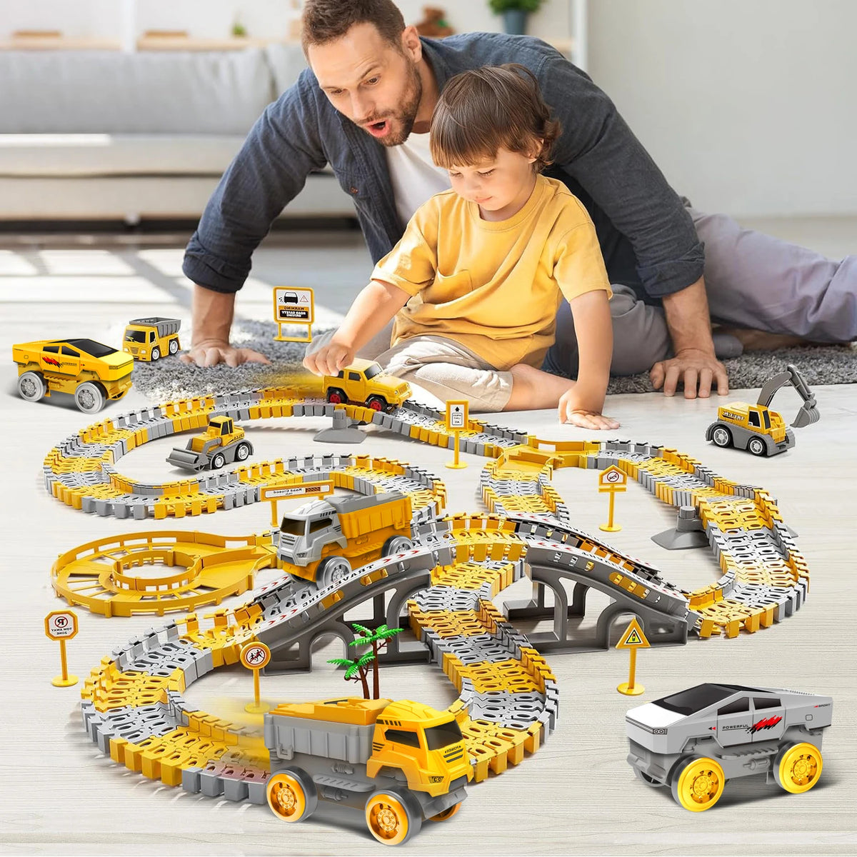 A set of glow-in-the-dark LED race cars and track for children on a wooden floor.