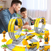 A yellow and gray flexible dinosaur race track toy set with electric cars being played with by a man and a boy.