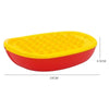 A red and yellow plastic building block tray with numerous studs for creating traffic vehicles.