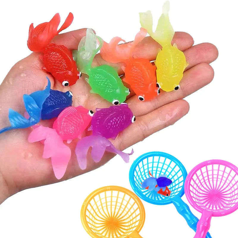A hand holds a set of colorful simulated goldfish bath toys, including red, green, orange, blue, and pink varieties.