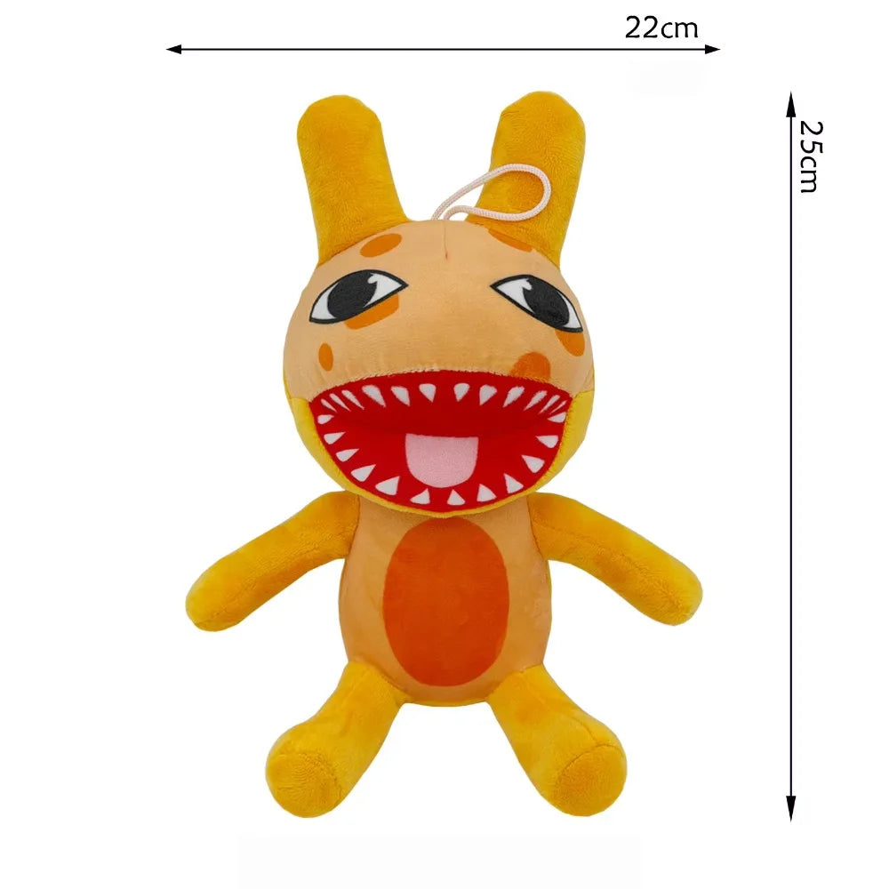 A yellow and orange plush toy resembling a cartoon animal with large eyes and a wide mouth.