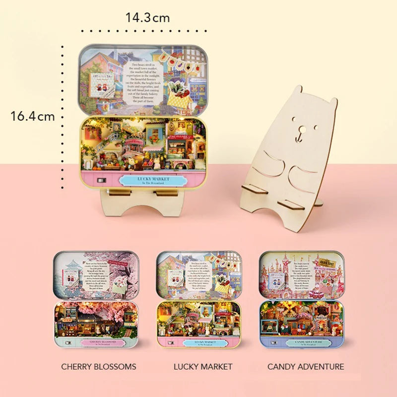 A set of wooden miniature dollhouse theater kits including Cherry Blossoms, Lucky Market, and Candy Adventure scenes.