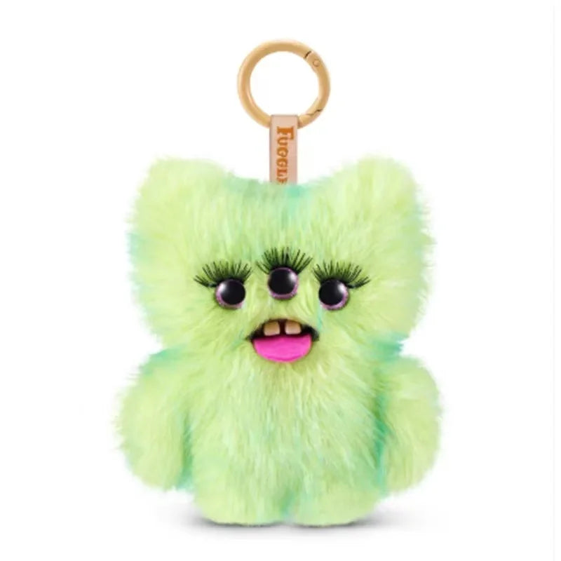 A fluffy, lime green alien plush toy with large eyes and a pink tongue attached to a gold-colored keychain ring.