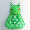 A bright green frog toy storage bag with suction cups and a frog-like face design.