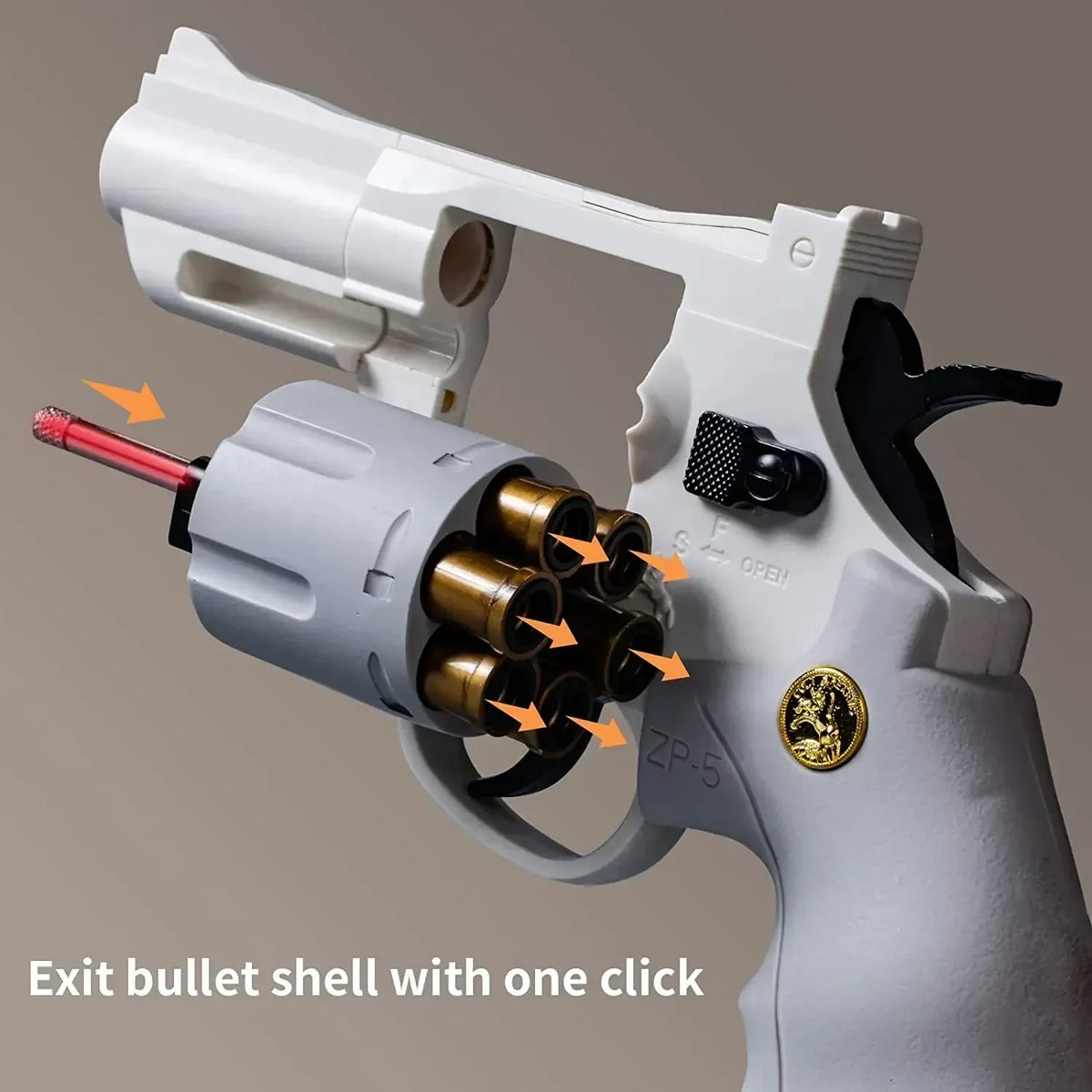 A white spring-powered revolver dart blaster is shown with an exit bullet shell being released.