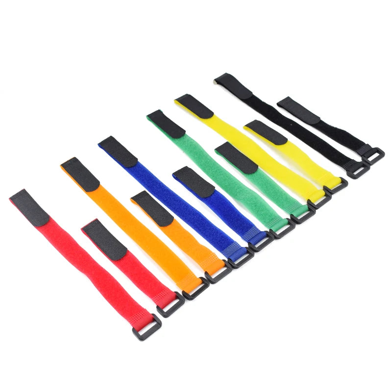 A set of five nylon bike handlebar straps in various colors including black, yellow, green, and blue.