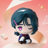 A blind box figure of a female character with dark blue hair and pink accents from the Alien Stage Art School Series.