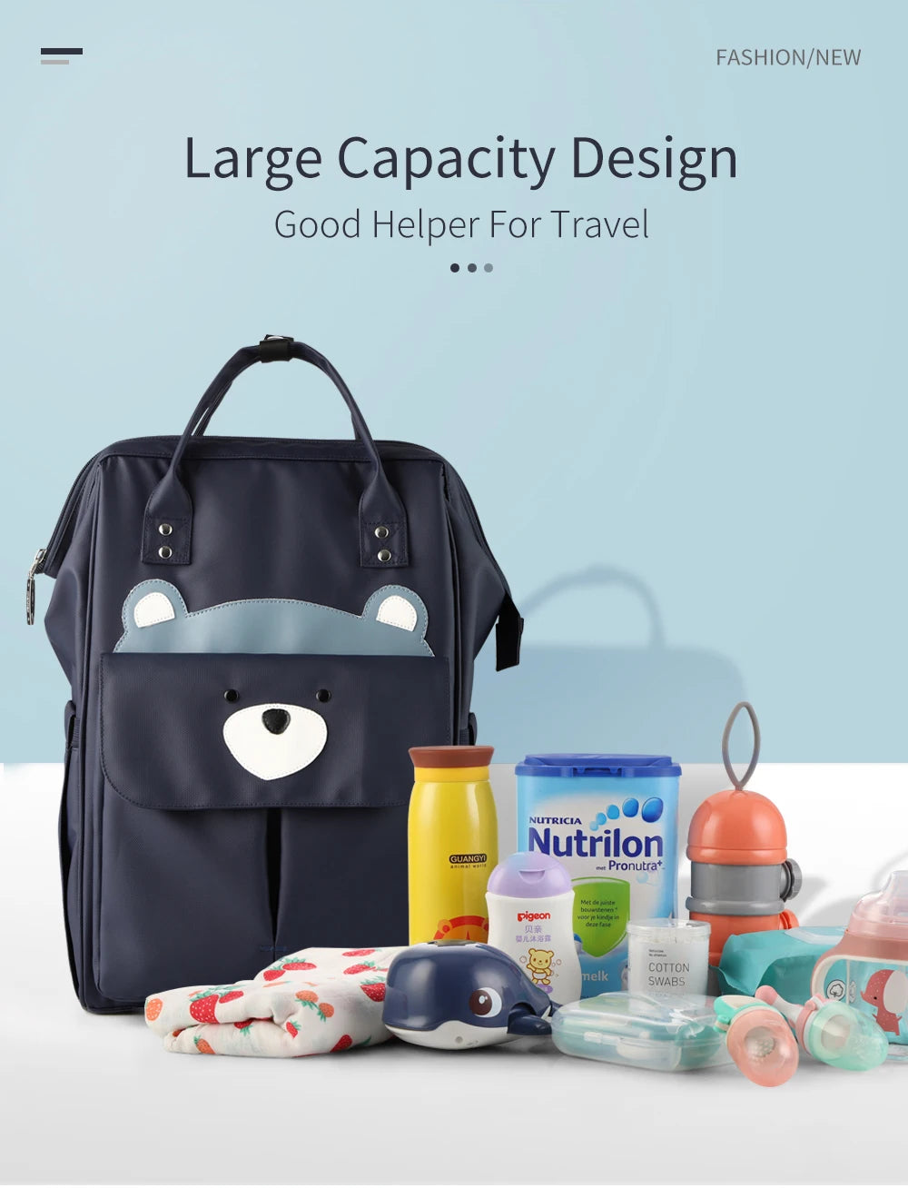 A navy blue waterproof diaper backpack shown with various baby essentials like wipes, diapers, and a changing mat.