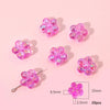 A collection of pink and purple acrylic flower beads for DIY jewelry making, shown with size measurements.