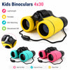 A set of four lightweight, portable binoculars in yellow, teal, and pink colors shown with a cord.