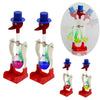A set of classic drinking bird toys with blue and red hats, featuring perpetual motion desk decor.