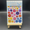 A sheet of Le Zhi stickers featuring various colorful flowers and shapes for crafting