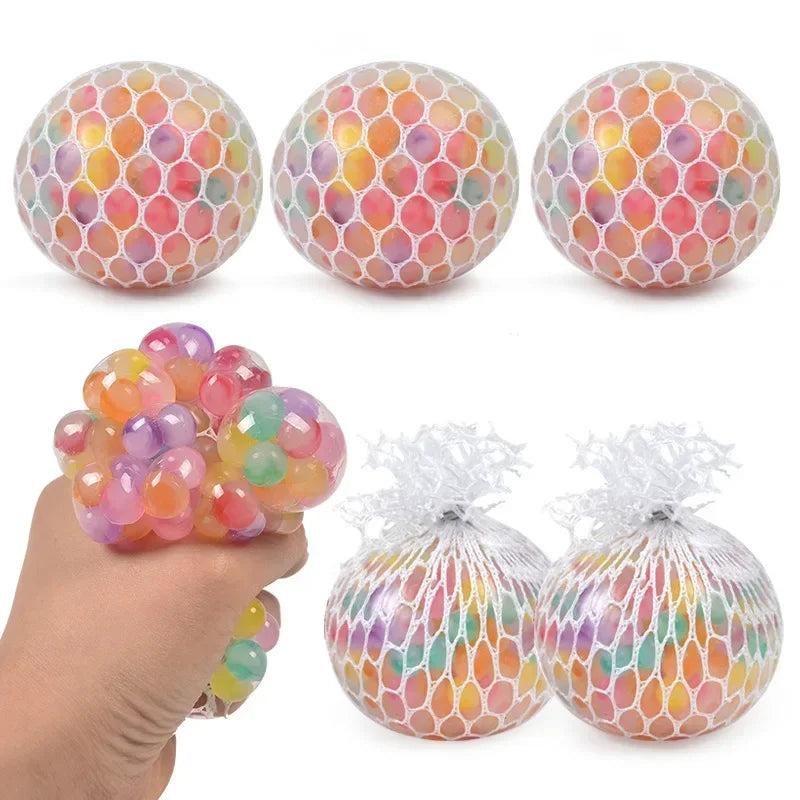 Rainbow squishy stress relief balls in various colors and patterns