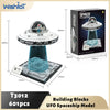 Building blocks set of a UFO spaceship model with lights and clear blue components