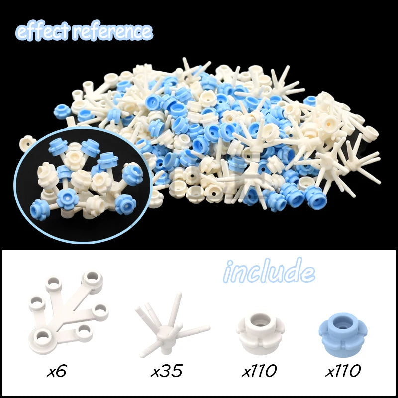 A collection of white and blue cherry blossom tree building blocks, including various pieces like flowers and branches.