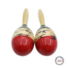 A pair of hand-painted wooden maracas with light wood handles and red bodies.