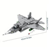 A silver J35 fighter jet model kit built from building blocks, shown in a side view.