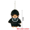 A small black plush cartoon character with a pom-pom head and a white collar hanging from a chain.
