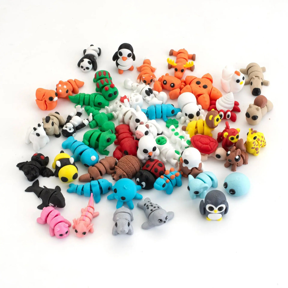 A collection of colorful poseable 3D printed animal figurine set featuring various small creatures and animals.
