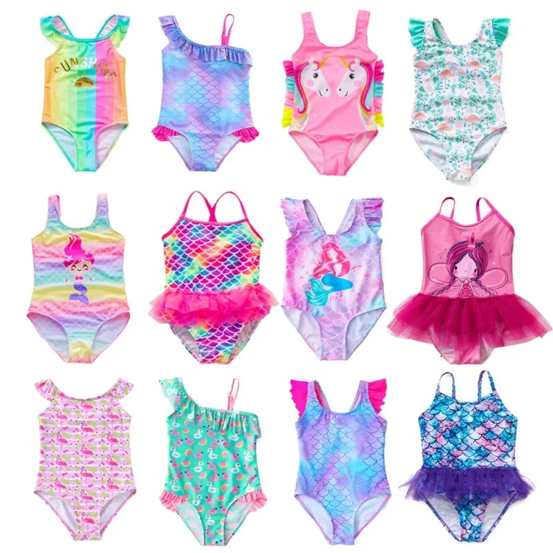 A collection of colorful kids mermaid and unicorn one-piece swimsuits in various patterns and colors.