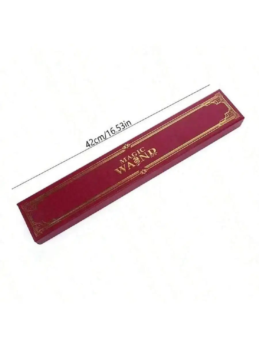 A long, rectangular red magic wand with gold detailing, shown diagonally.
