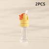Two pieces of a yellow and orange anti-choking straw and bottle cap converter for kids
