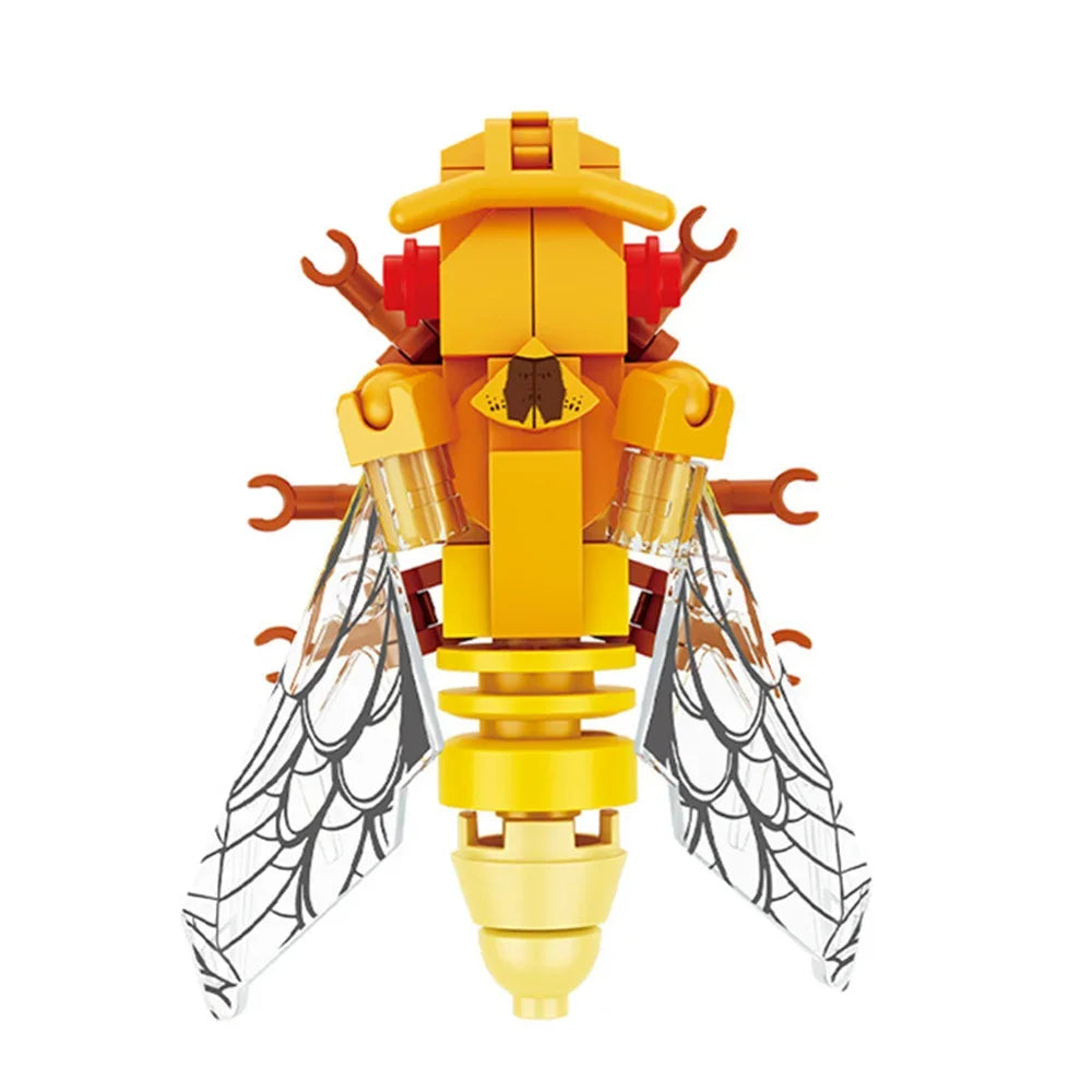 A yellow insect building block set featuring a bee or similar creature with translucent wings and orange details.