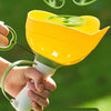 A hand holds a yellow flying saucer toy, demonstrating its launch altitude with various piece counts.