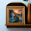 A framed painting featuring a large fish in water with an orange and purple sunset background.