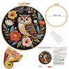 Embroidery kit featuring an owl and flower design on a circular canvas with a measuring guide.
