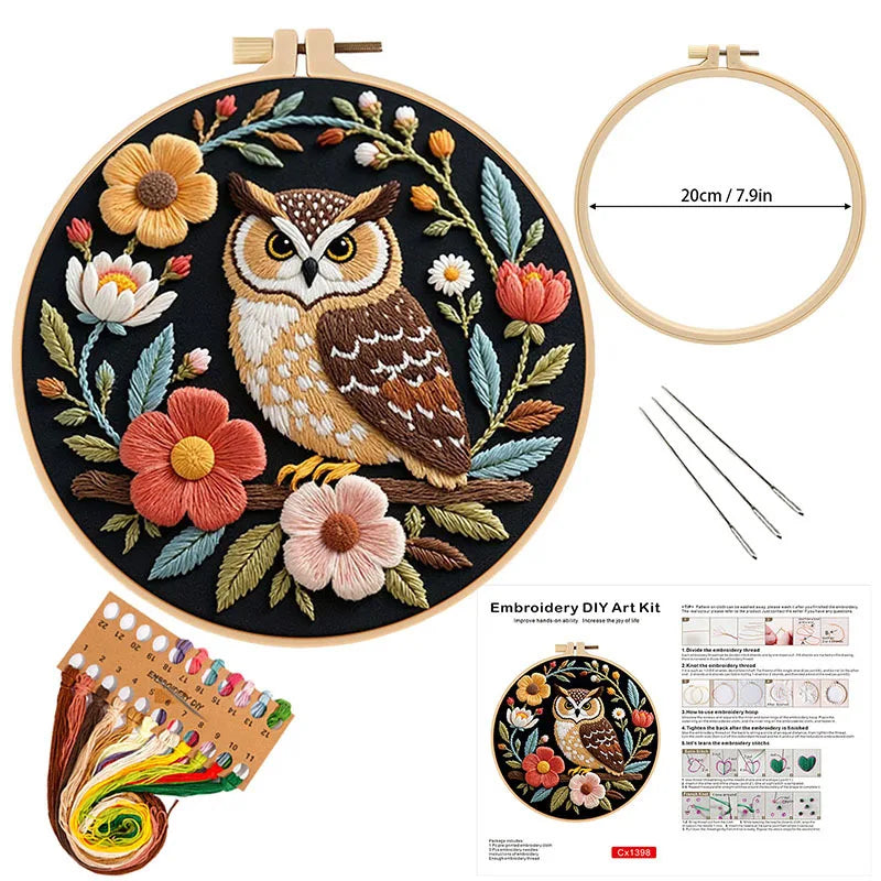 Embroidery kit featuring an owl and flower design on a circular canvas with a measuring guide.