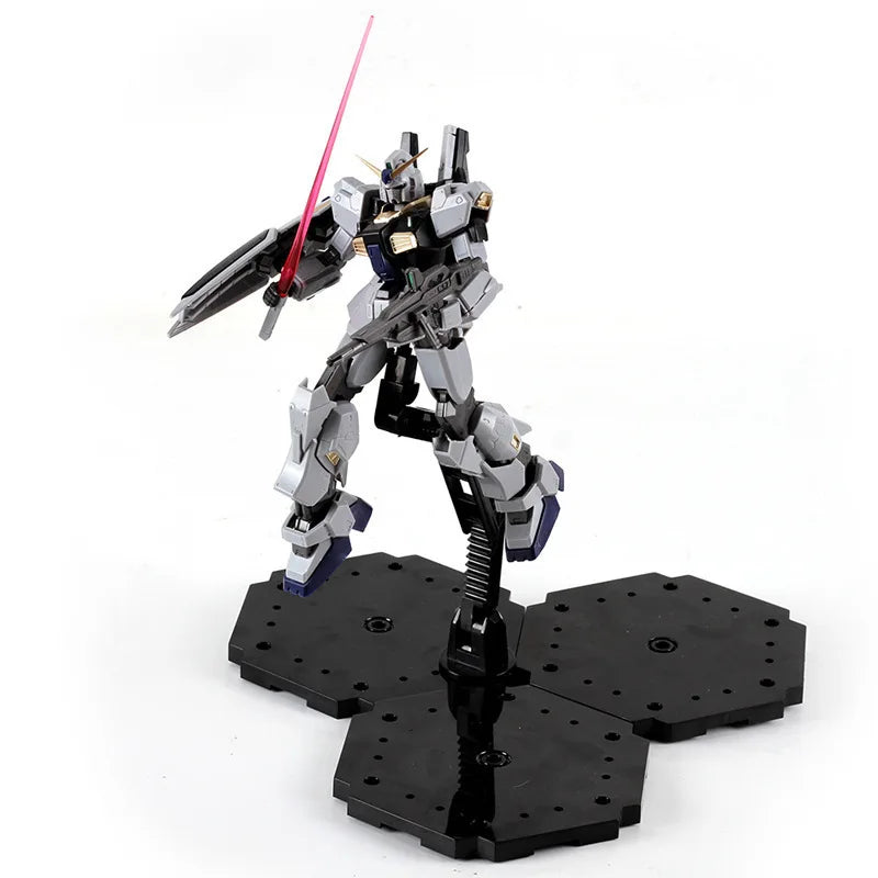A silver and black mecha action figure standing on an adjustable snake bone stand.