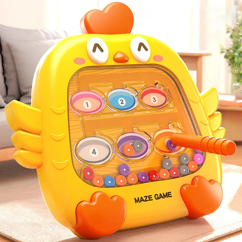 A yellow, squid-shaped magnetic puzzle board with numbered colored discs for a maze game.