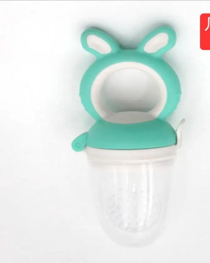 A silicone baby food feeder with a teal-colored top and a clear container.