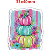 A colorful stack of three decorative pumpkins in pink, teal, and lime green stripes with floral accents.