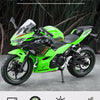 A green 1:12 scale Ninja motorcycle diecast model featuring simulated sound and light functions.