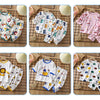 A collection of colorful cotton pajama sets for boys and girls featuring various patterns and designs.