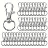 A collection of metal keychain hooks, swivel clasps, and key rings for DIY crafts and jewelry making.
