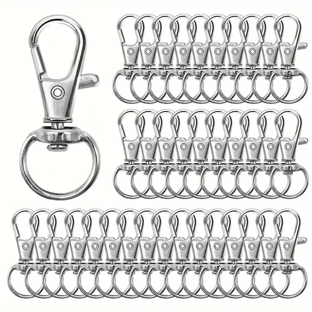 A collection of metal keychain hooks, swivel clasps, and key rings for DIY crafts and jewelry making.