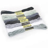 A set of multicolor embroidery floss skeins with a glitter finish, bundled together.