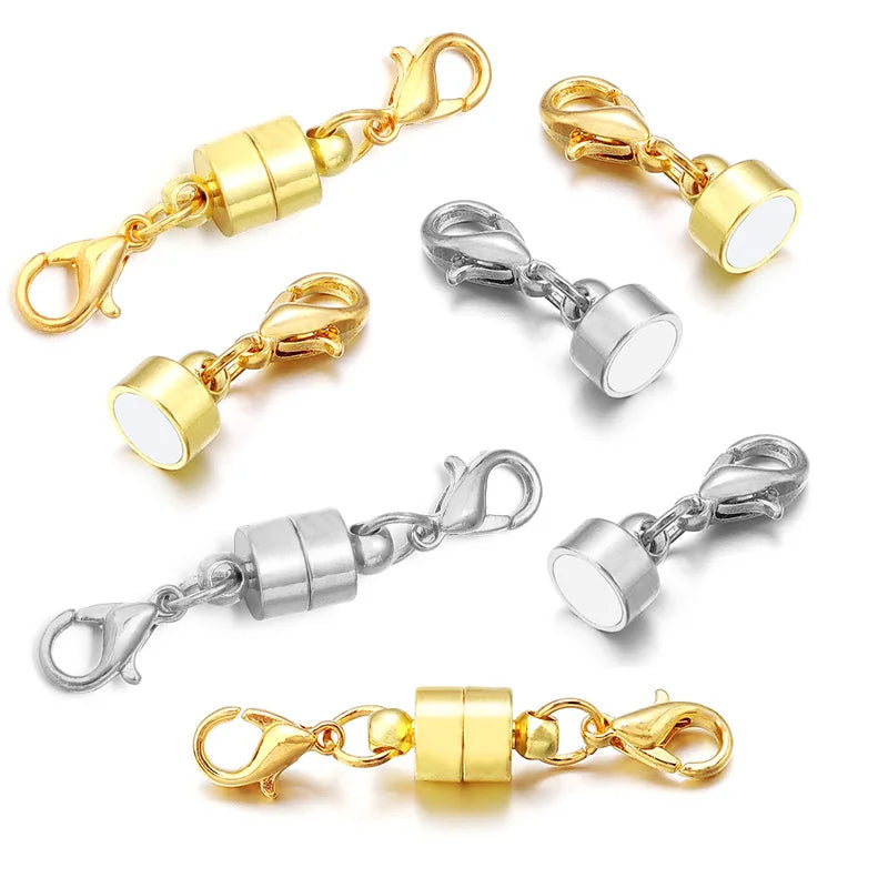 A collection of gold and silver magnetic clasps and connectors for jewelry making.