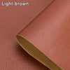 A close-up of a light brown leather patch or material, showing its texture and edge.