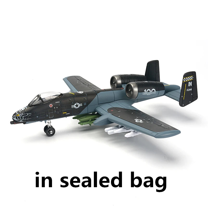 A detailed plastic model of an A-10 Warthog aircraft in a gray and black camouflage scheme.