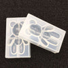 A clear silicone mold with bear-shaped cavities for resin jewelry and crafts