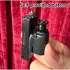 A hand holds a black floating can magic trick with levitation effect against a red velvet background.