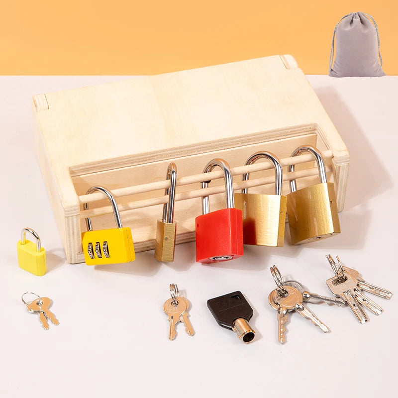 A wooden lock and key toy set with various colored locks and keys displayed next to a wooden box.