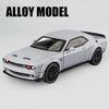 A white diecast model of a Dodge Challenger SRT Hellcat car.