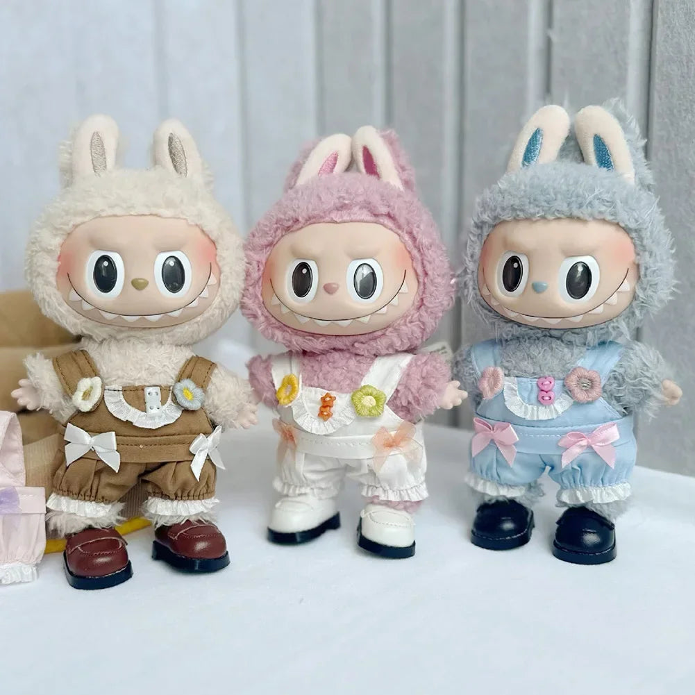 Three fluffy Labubu dolls wearing casual sneakers and outfits.