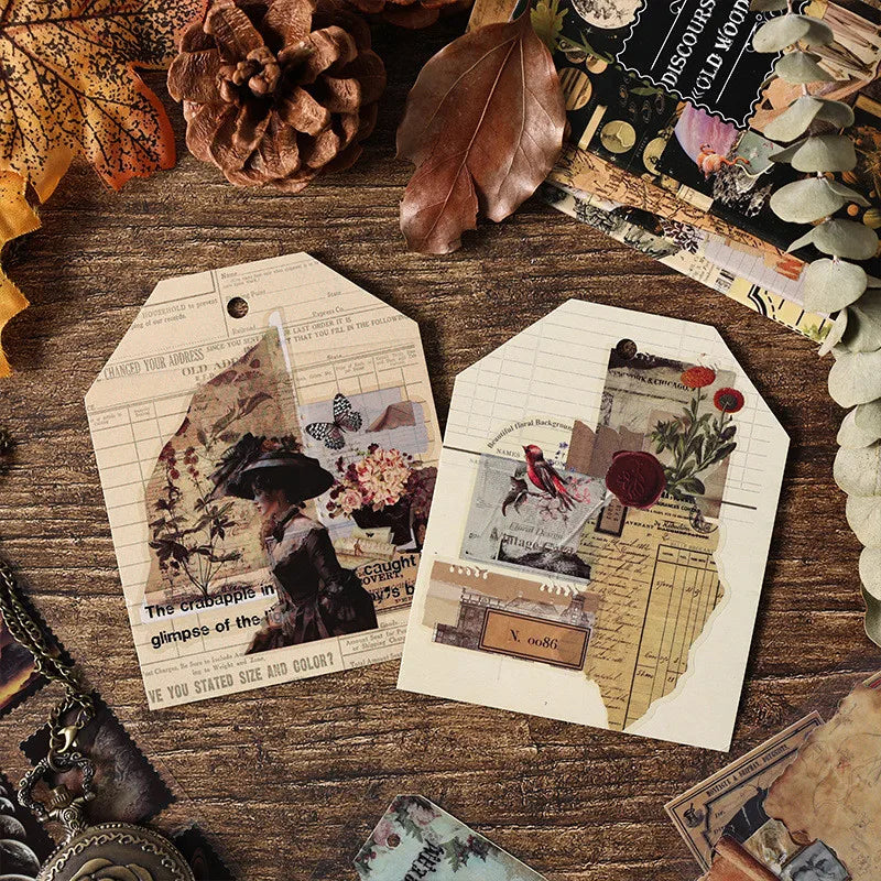 A flat lay of vintage PET sticker sheets, dried leaves, pinecones, and aged paper on a wooden surface.